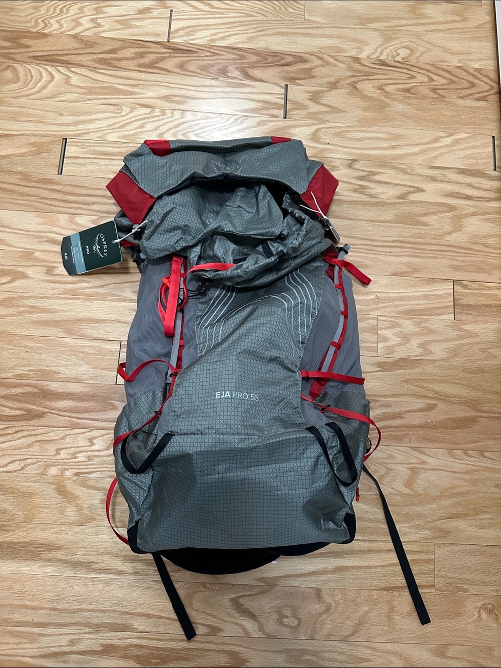 OSPREY Eja Pro 55 Backpack in Gray with Red Accents M/L